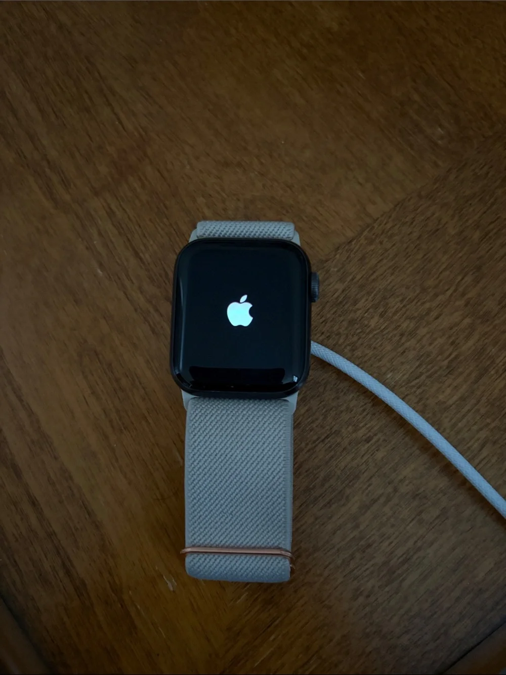 Apple Watch Series 5 with Black Case and Cream Woven Band